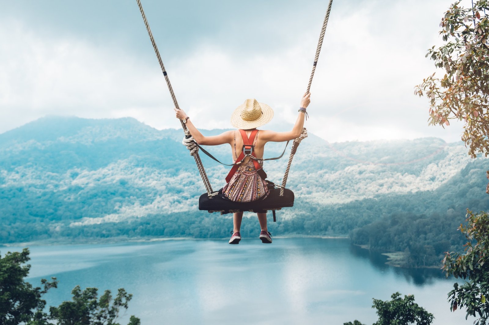 beautiful-girl-enjoying-freedom-on-swing-in-bali-indonesia.jpg
